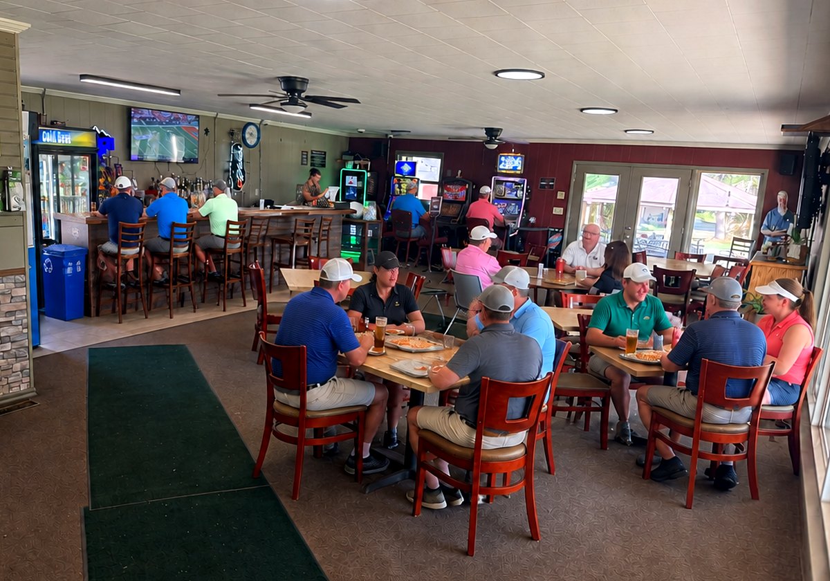 The bar and dining area inside the Twin Oaks clubhouse